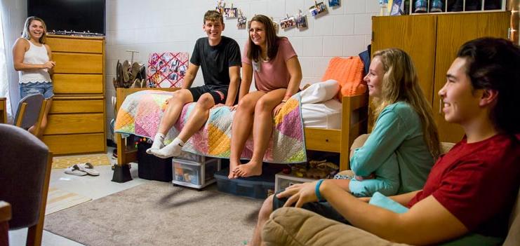 Students gathering in a residence hall